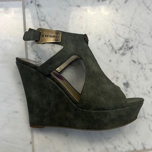4 1/2 inch Guess suede wedges.